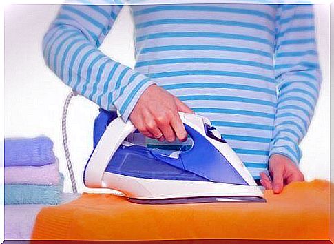 Woman ironing clothes