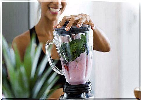 Woman making smoothie