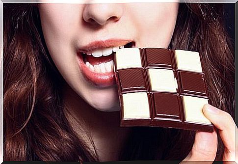 Woman eating chocolate