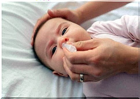 A baby who gets his nose rinsed.