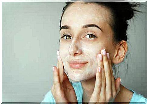 A woman with face cream on