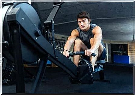 Muscle hypertrophy: A man sitting on a rowing machine at a gym