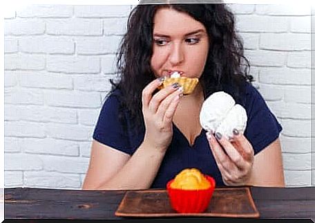 A woman who eats pastries as one of the consequences of overeating